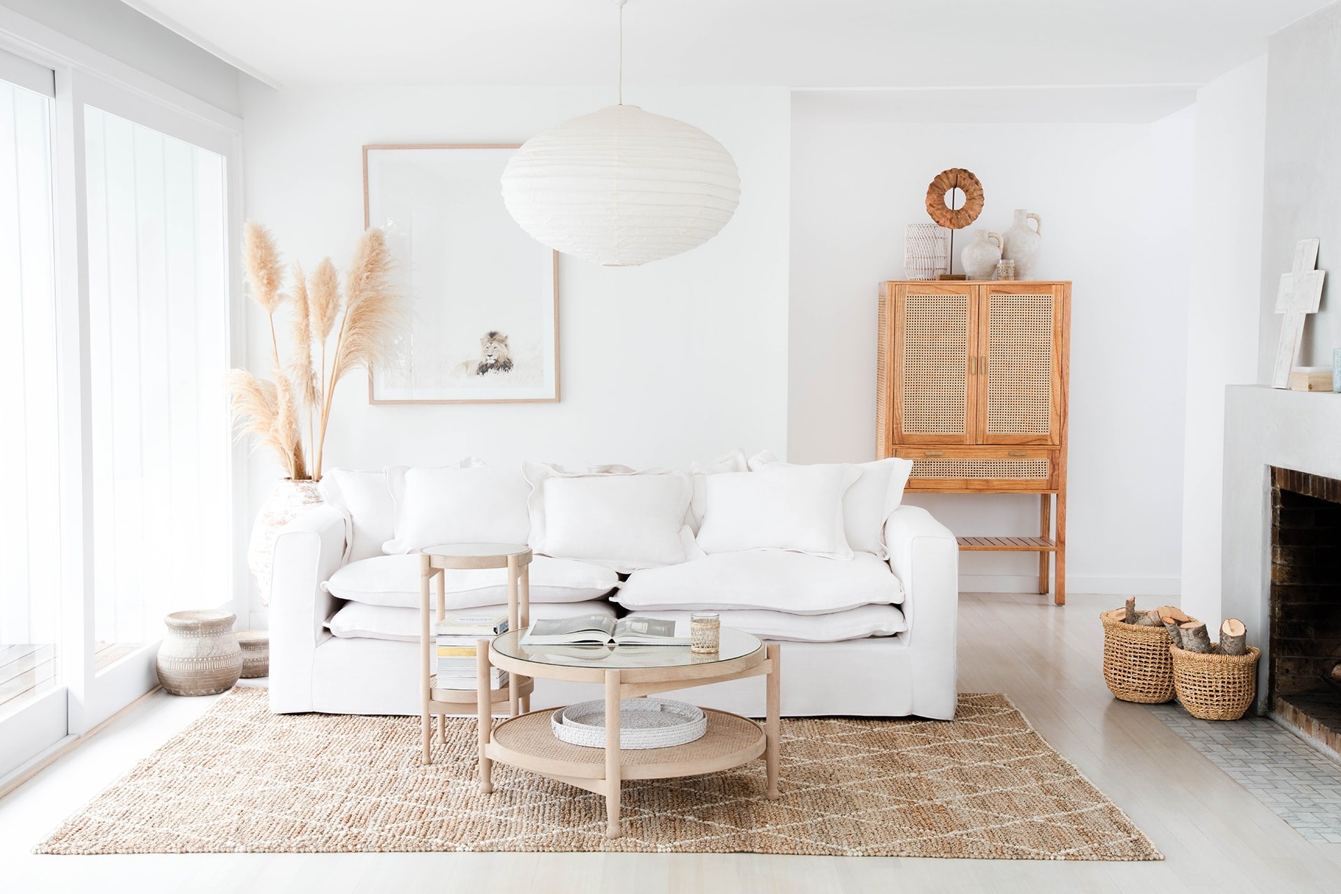 all white coastal living room with oz design white coastal sofa and jute rug