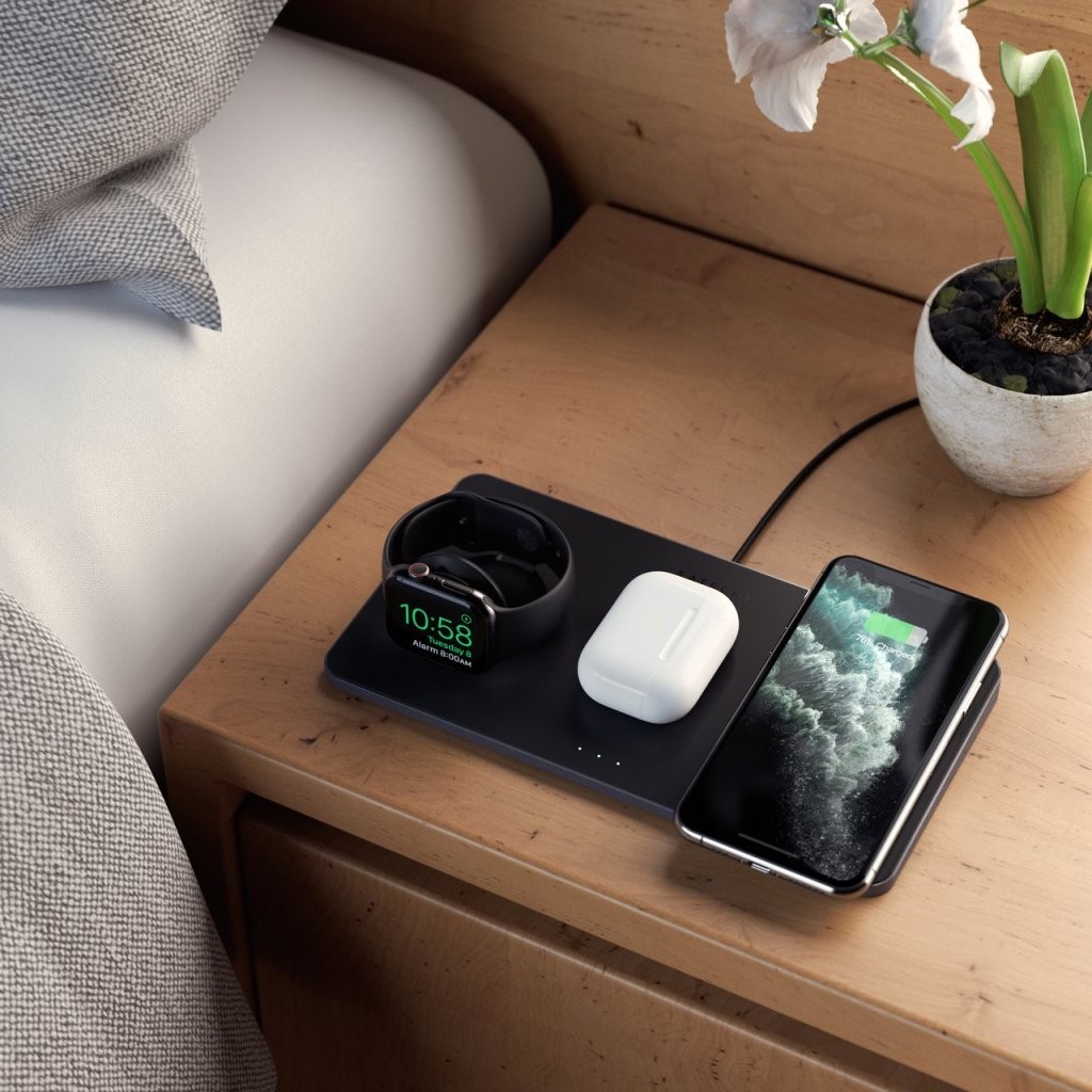 bedside table with charging station for smartphone and earpods