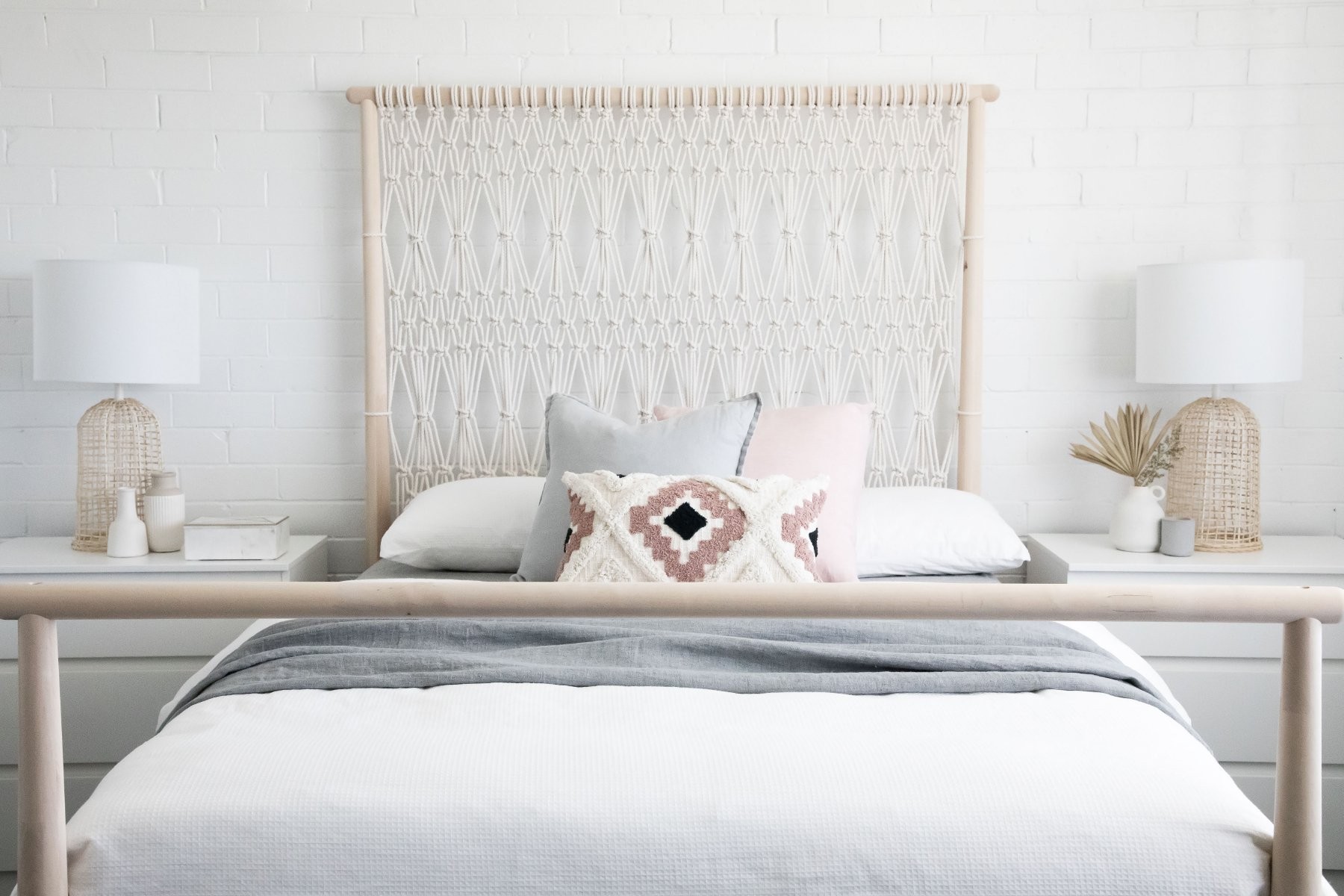 boho rope and timber headboard in all white bohemian bedroom