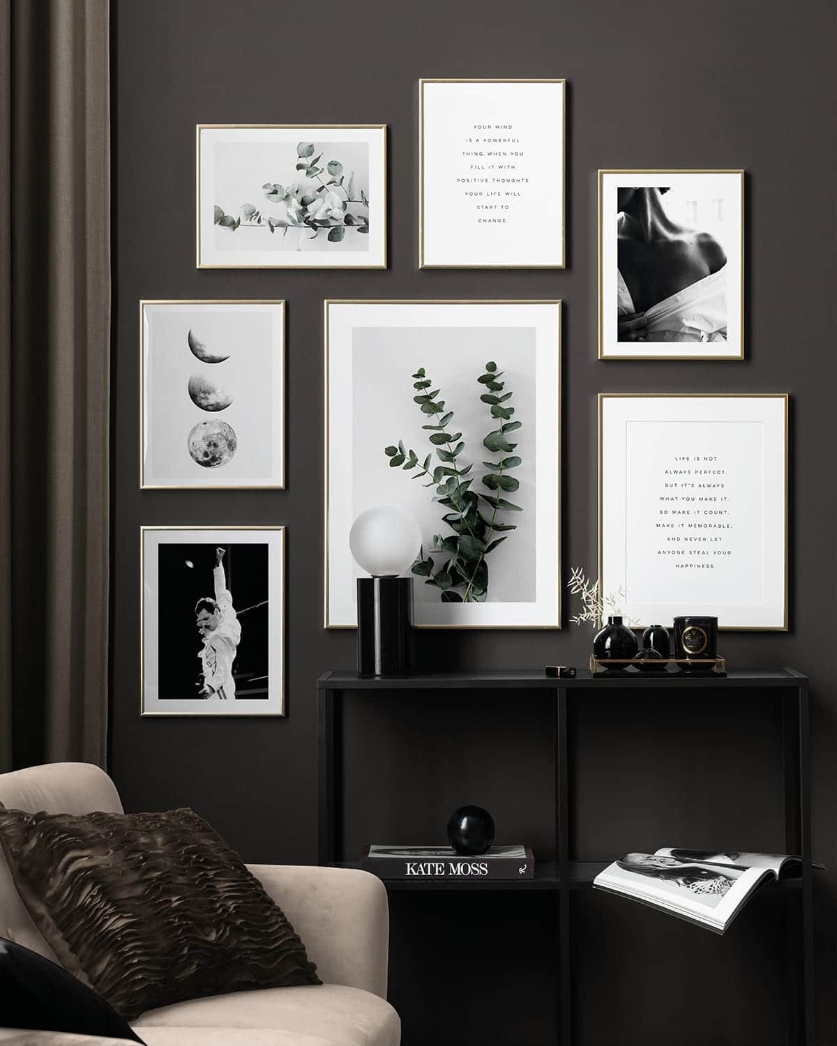 charcoal grey feature wall with gallery wall of art prints from desenio