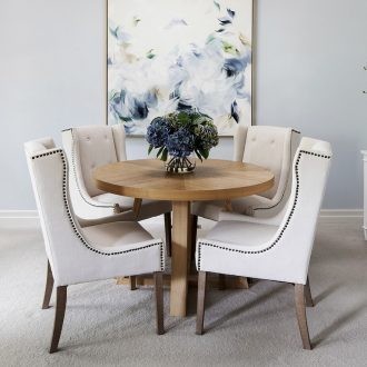 classic hamptons interior design dining room with chalie macrae art on light blue wall