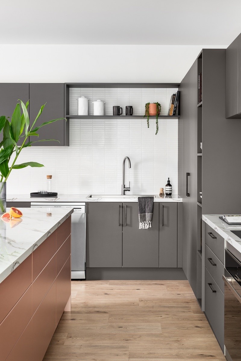 dark grey kitchen cabinets with white tile splashback kaboodle kitchens
