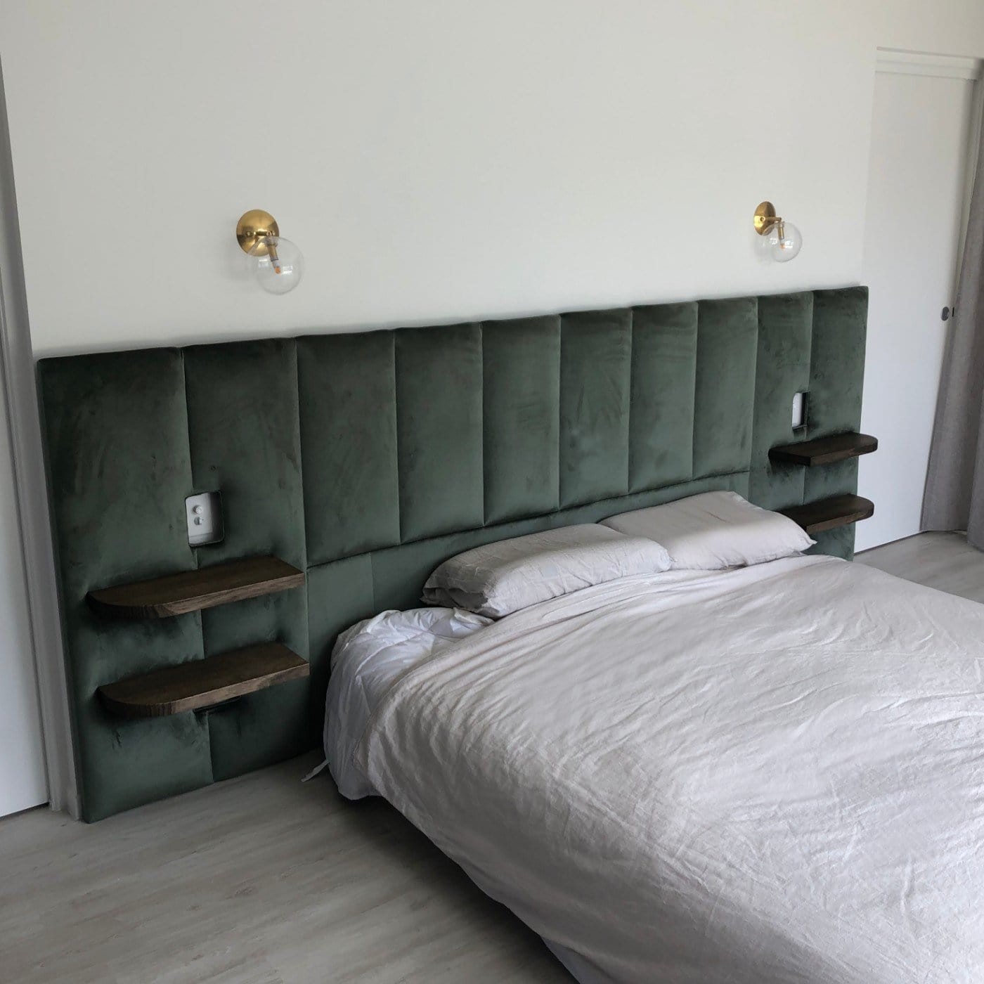extra wide headboard velvet green panels with light switch wall sconces