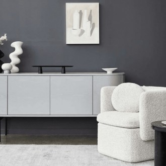 globewest boucle armchair in luxe living room with white sideboard