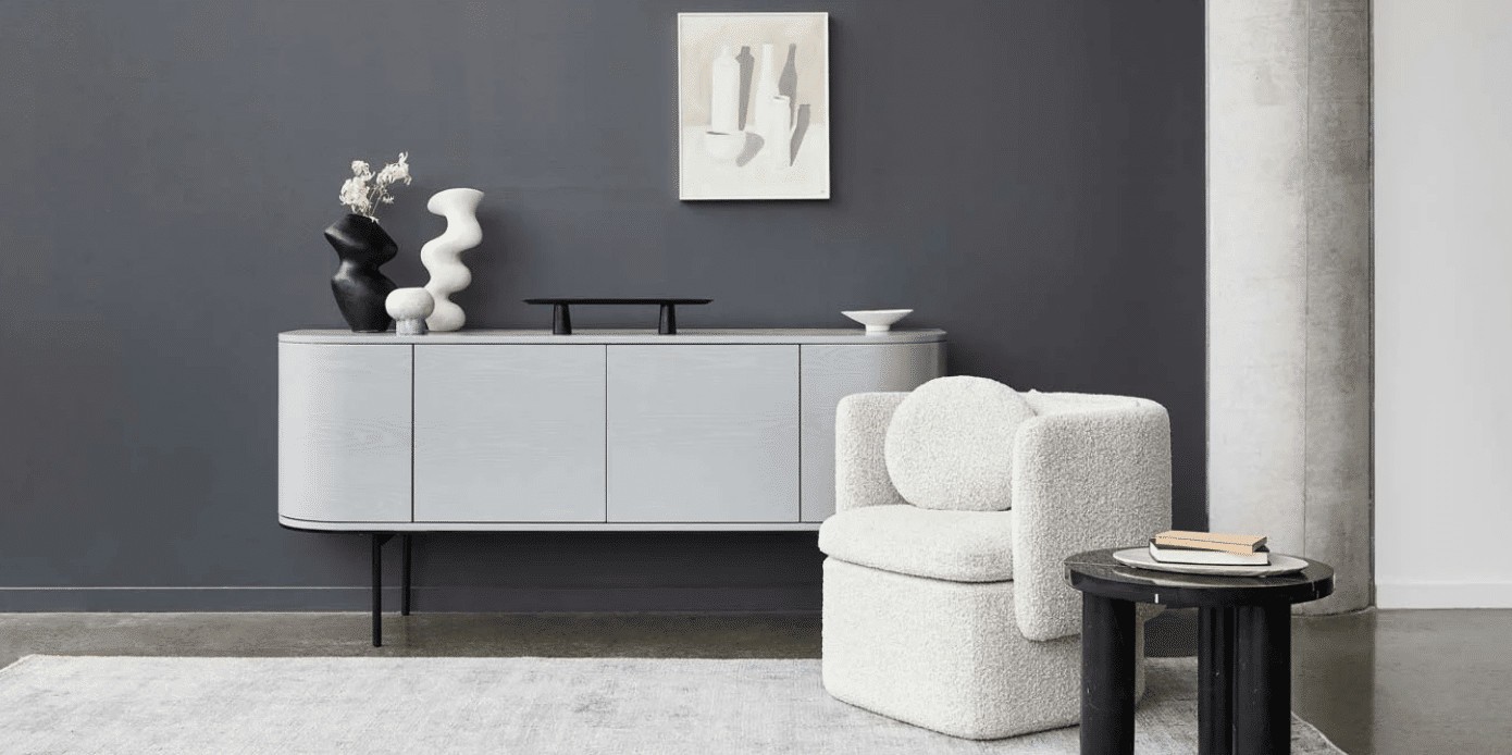 globewest boucle armchair in luxe living room with white sideboard