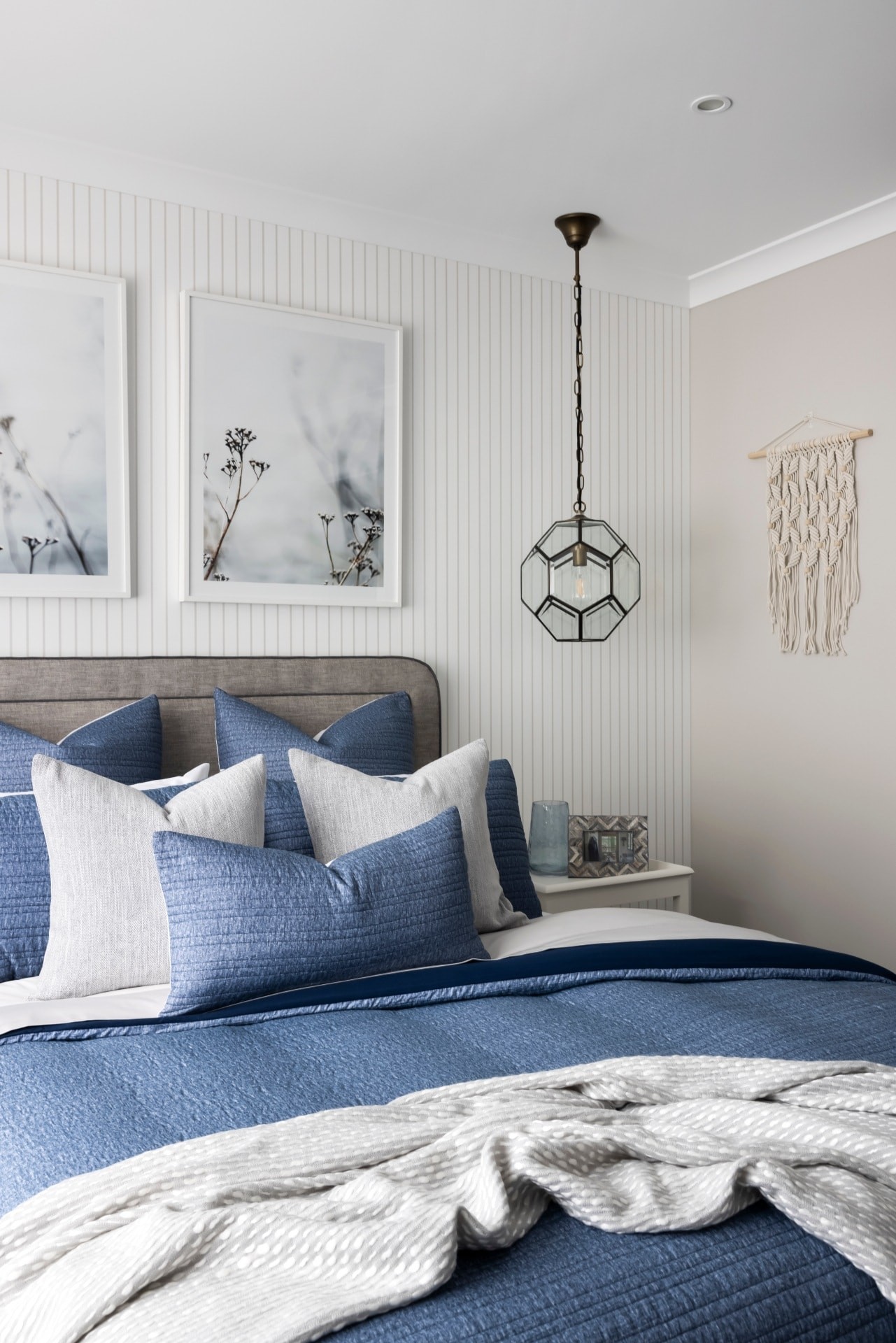 hamptons bedroom design ideas soft blue quilt cover set on bed with industrial metal and glass pendant lights