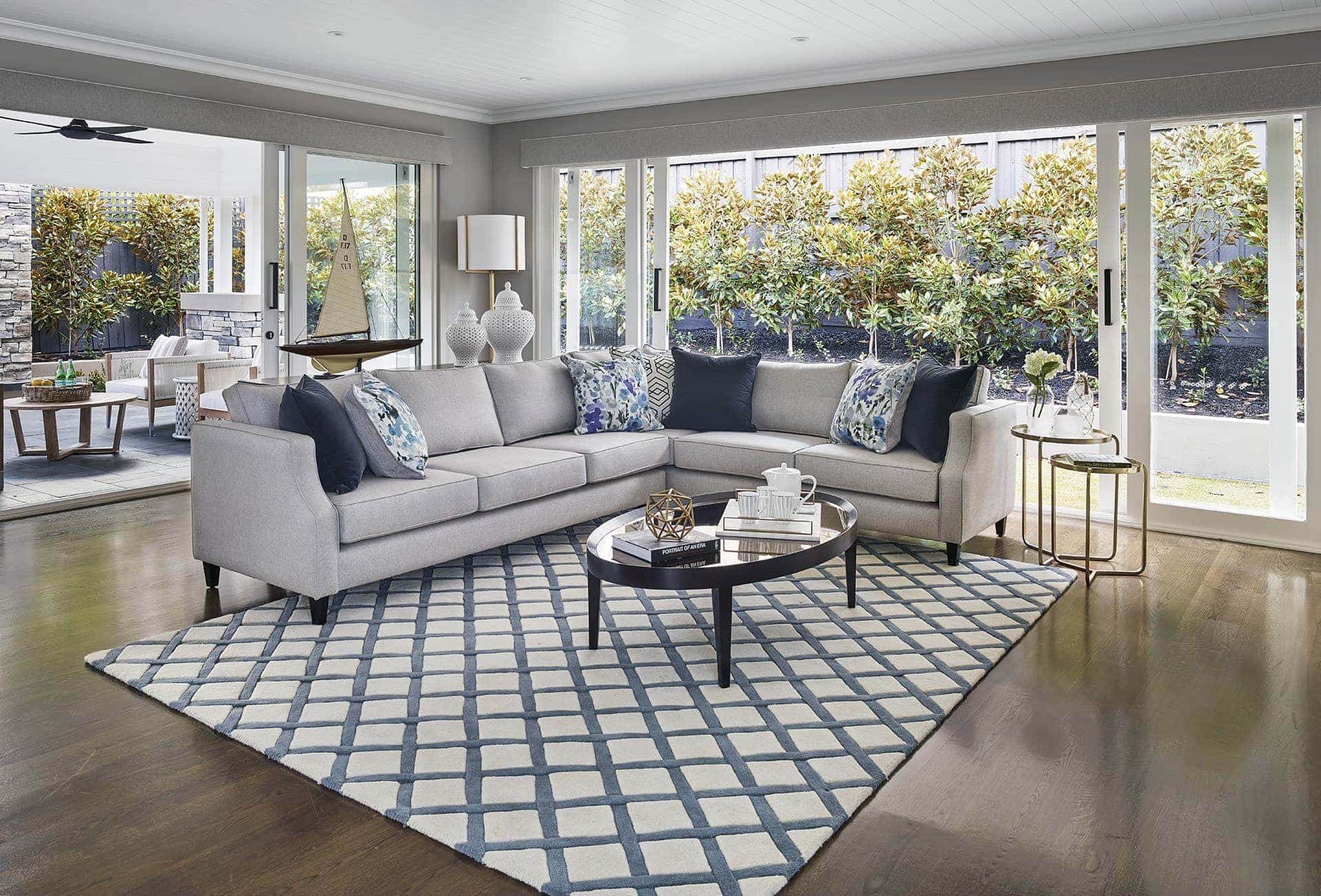 hamptons style living room with blue and white diamond hamptons rug
