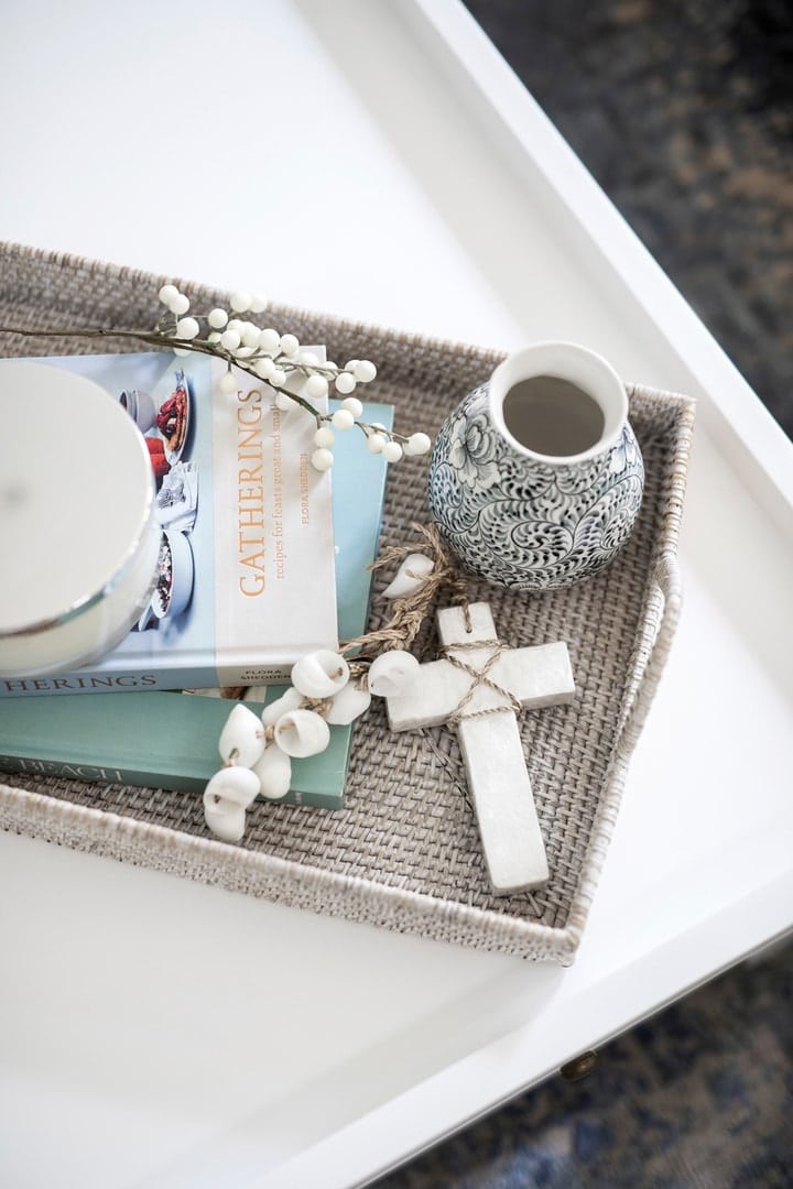 hamptons tray on coffee table with hamptons vignette styling coastal cross ornament