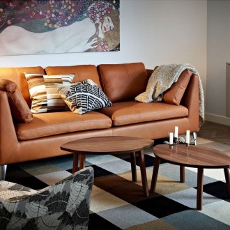 ikea stockholm leather sofa in moody urban living room