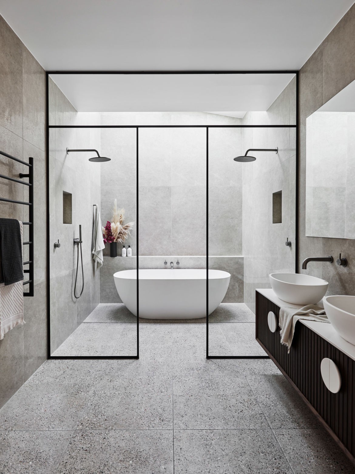 luxe bathroom with walk in shower black frame shower and bath in wet zone 2020 bathroom design trends