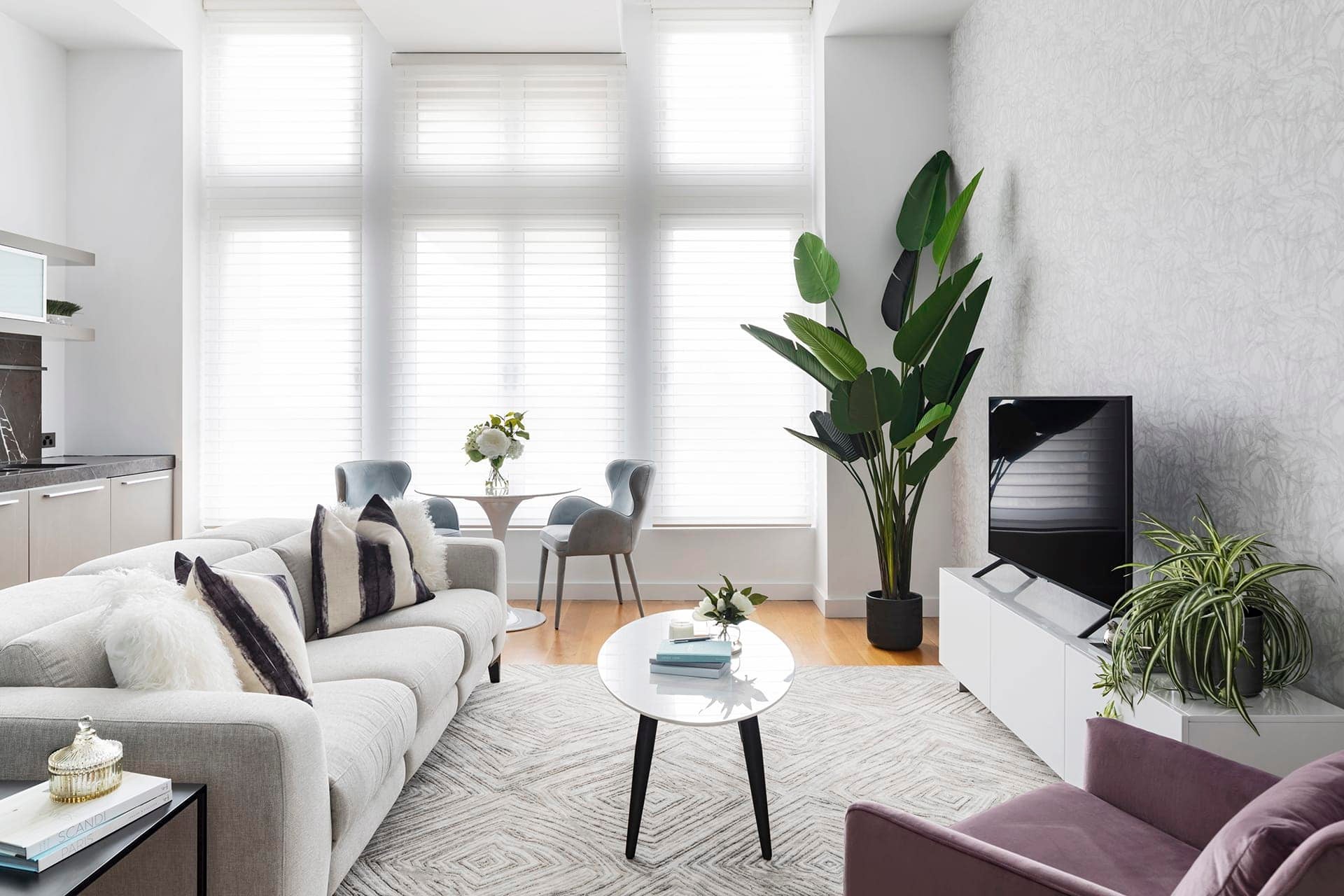 Melbourne apartment make over with grey recliner sofa from Plush and blinds from Luxaflex