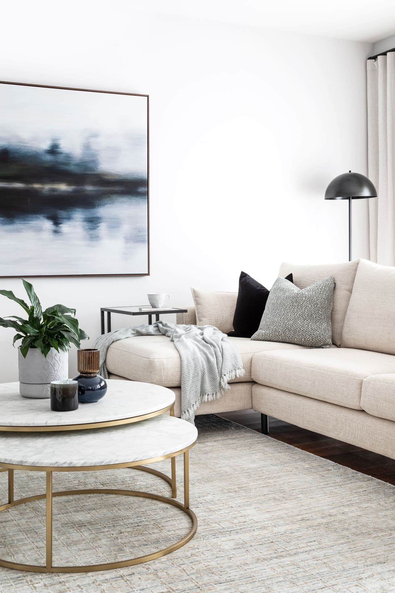 monochromatic living room design with gold leg marble coffee table from globewest
