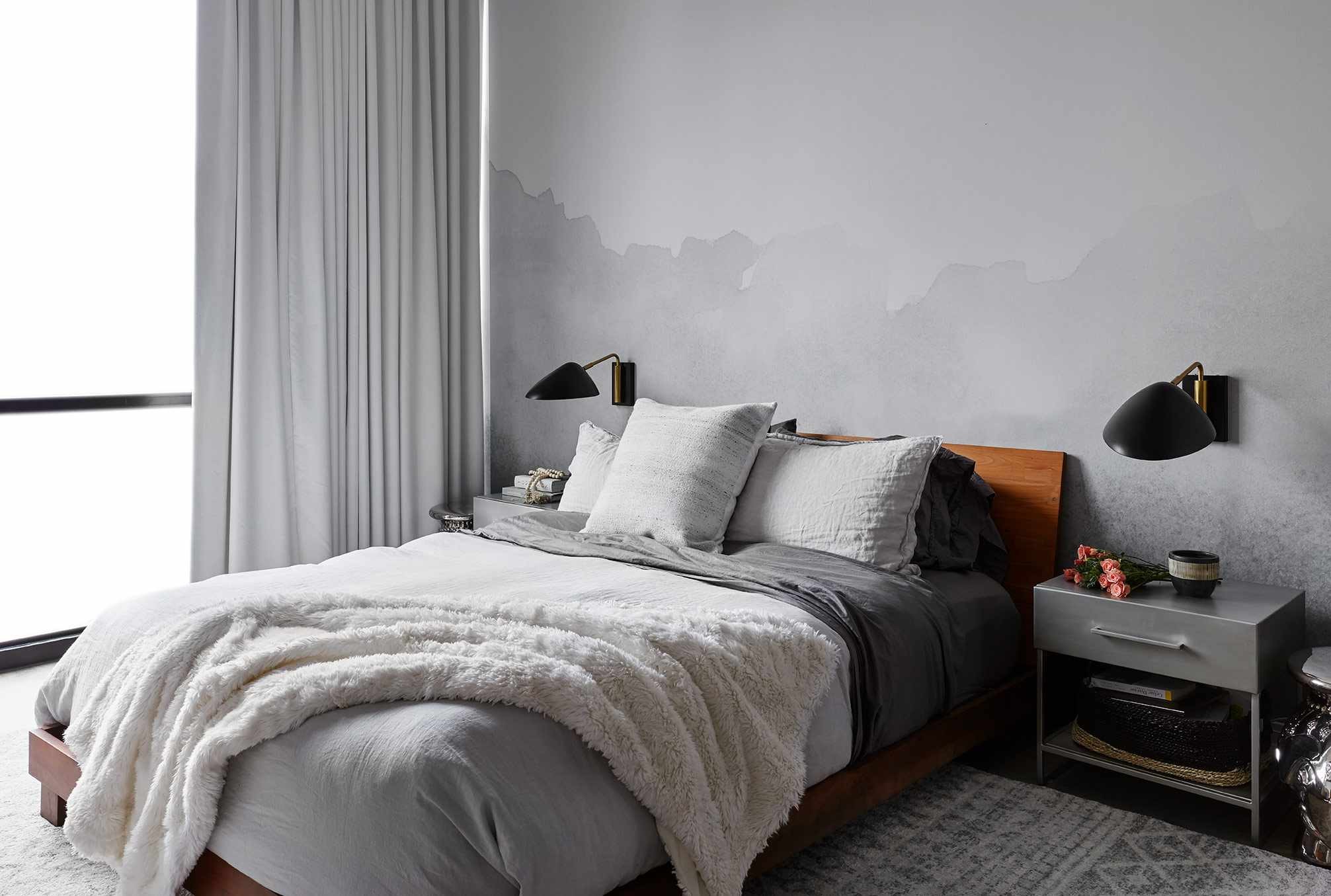 moody mens bedroom with grey paint effect wall