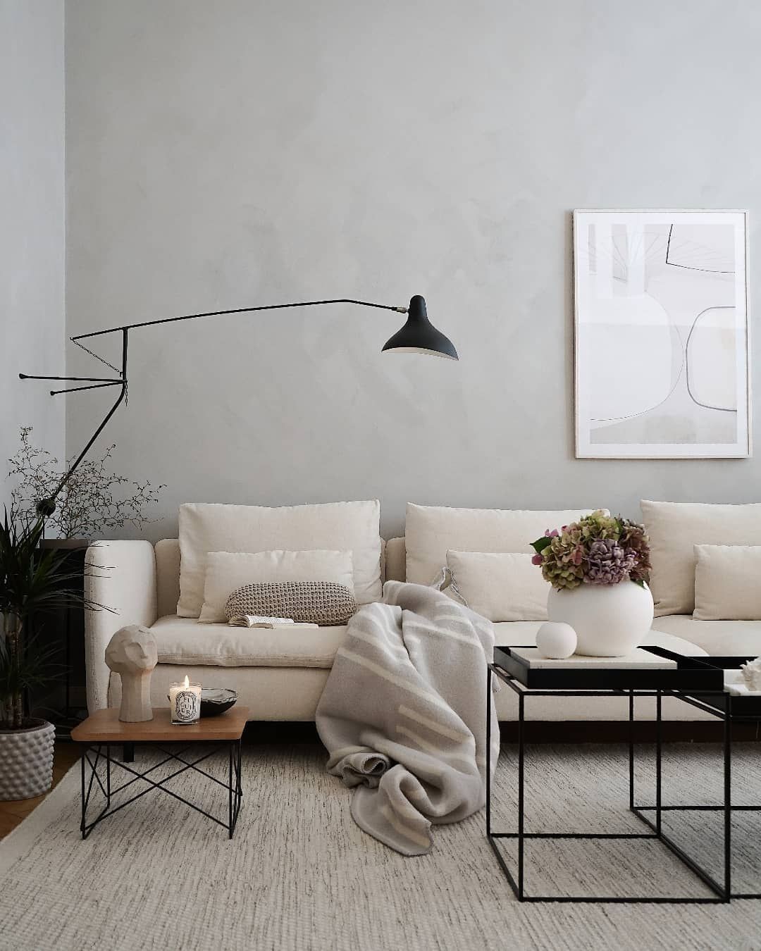 neutral living roo with cream sofa and suede paint effect on walls
