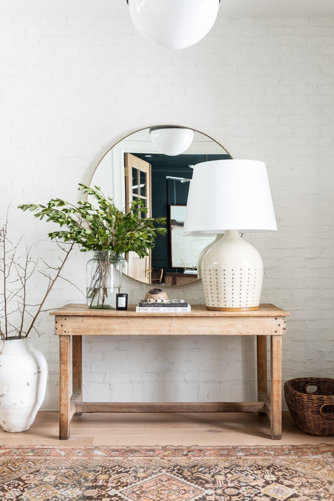 oversized table lamp with white shade on rustic timber console table in entryway | TLC Interiors
