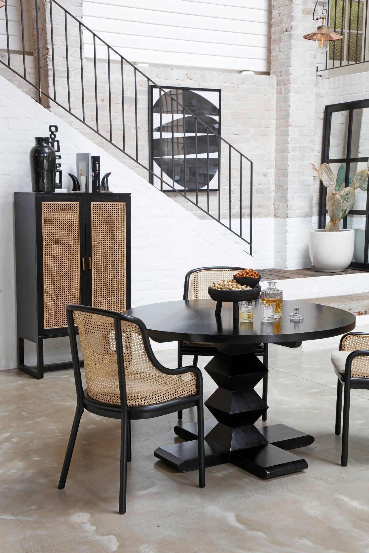 oz design dining room furniture with rattan storage cabinet and round black dining table