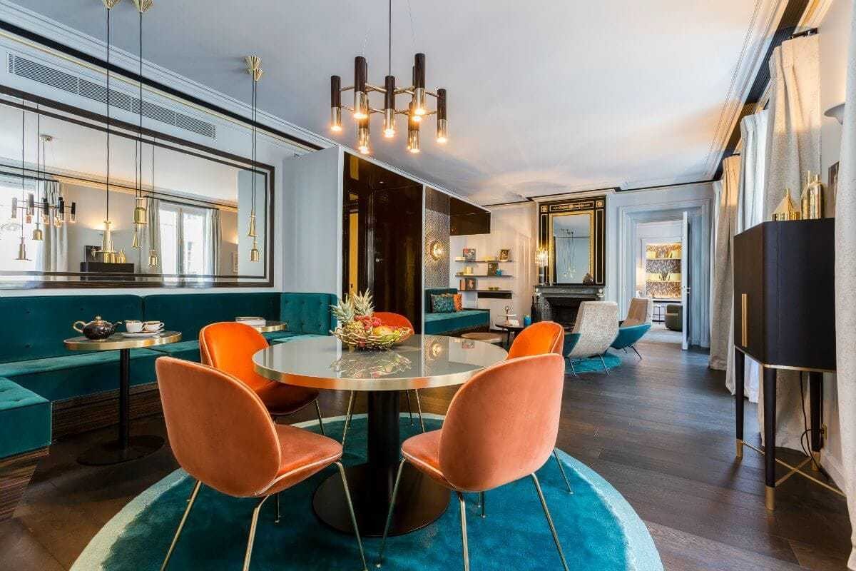Parisian Design French Apartment with Orange and Teal Velvet