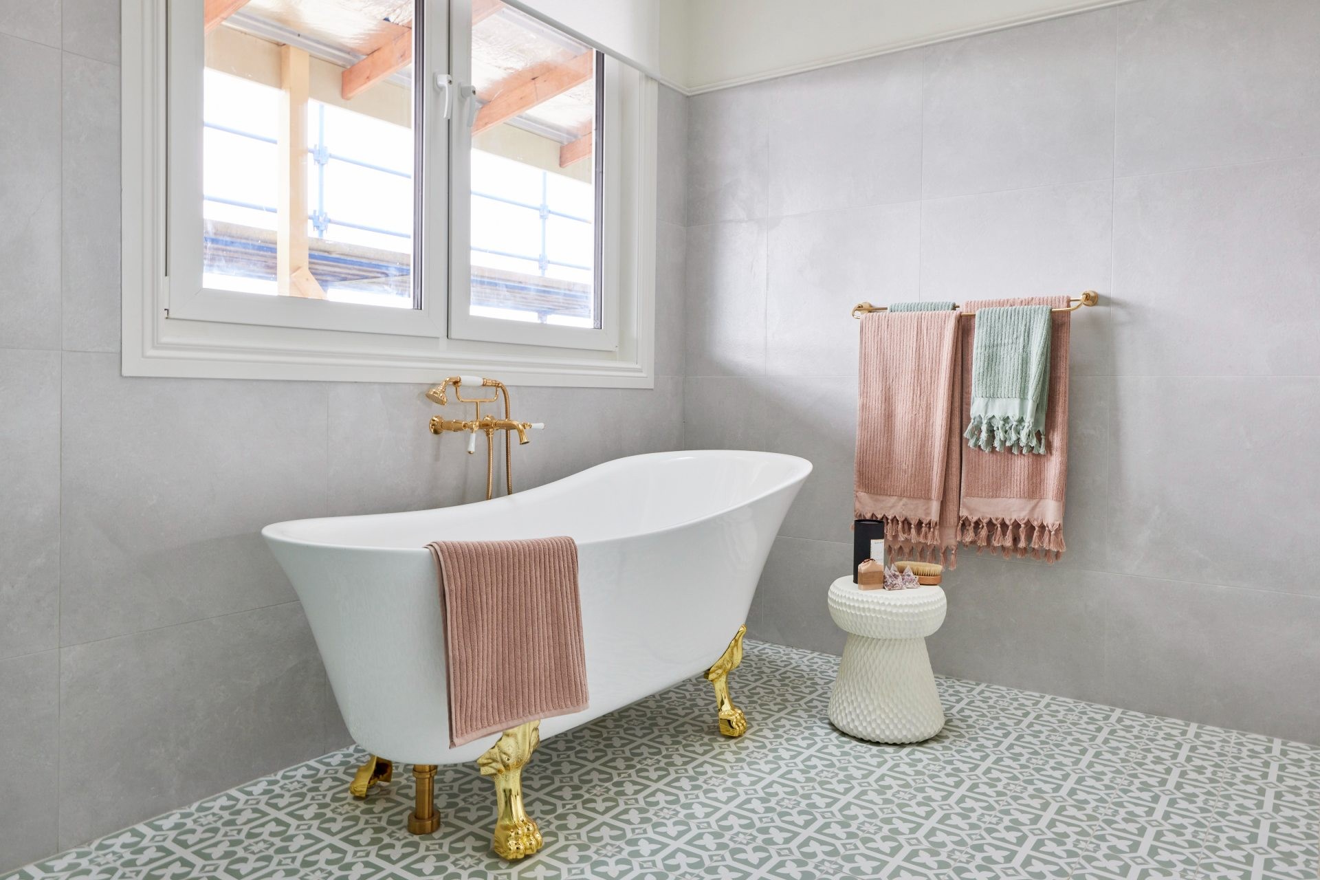 the block 2020 bathroom reveal dylan and jenny bathroom with pink towels and brass hardware