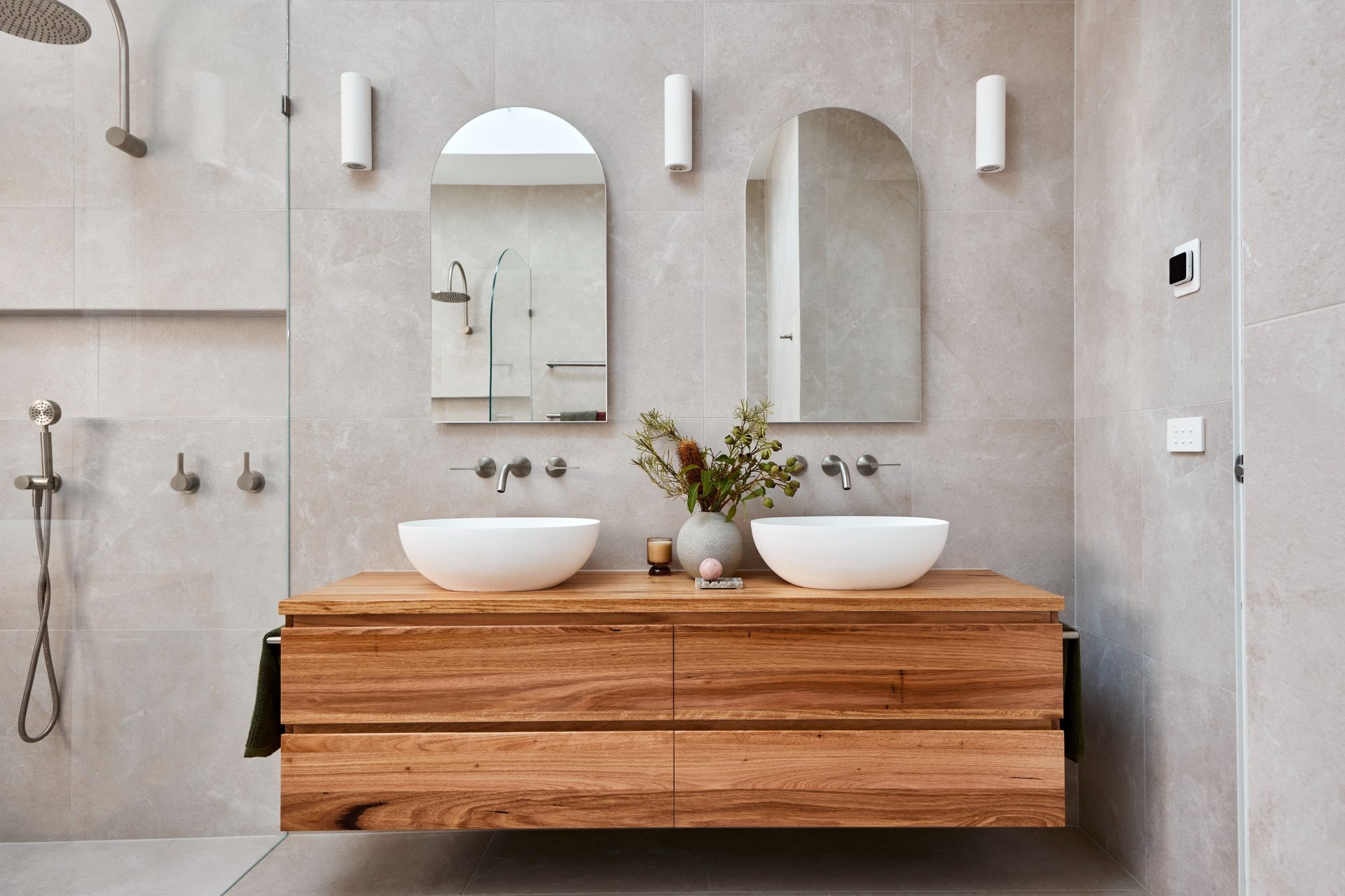 the block 2020 bathroom reveal rachael and ryan floating timber bathroom vanity with arched mirrors