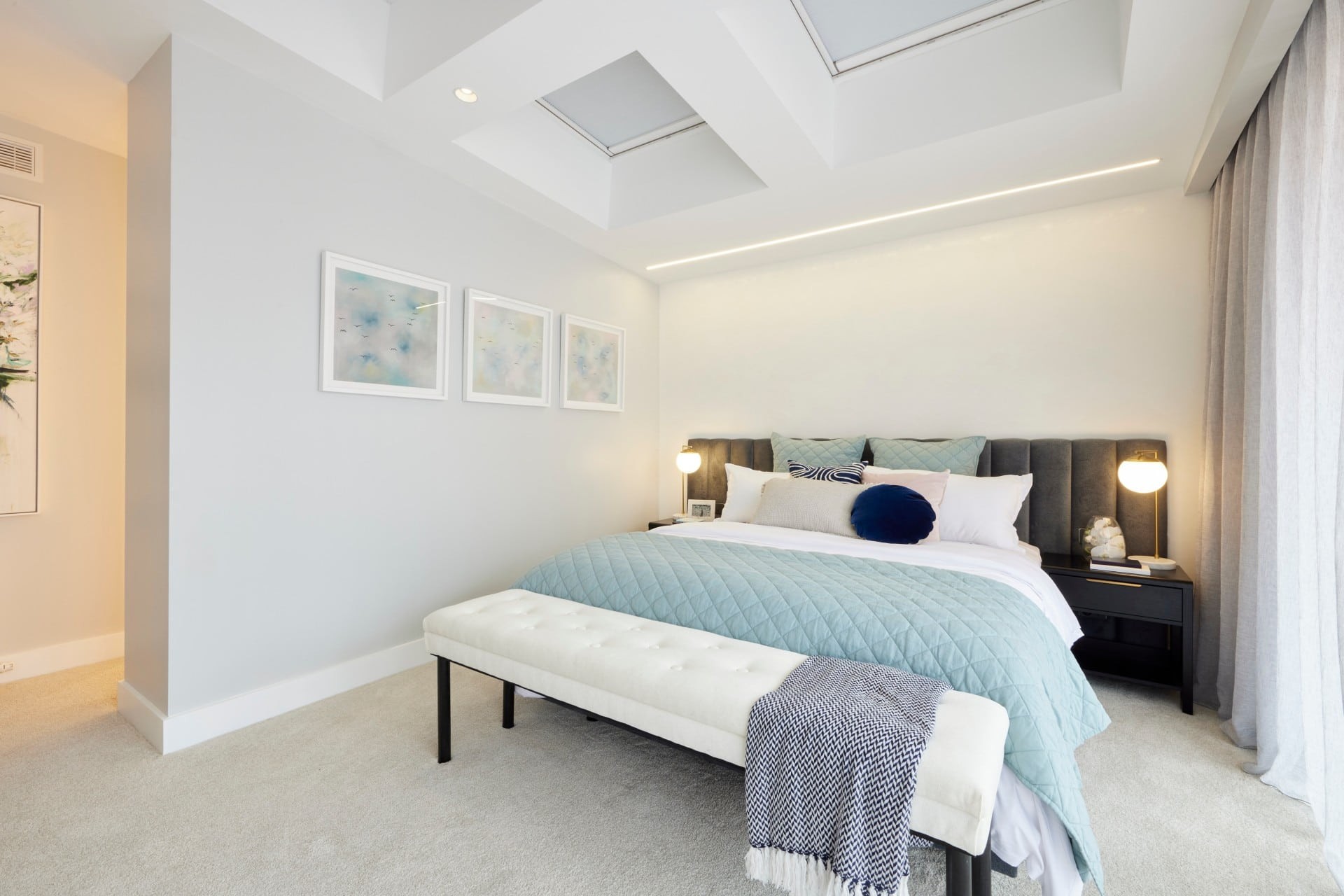 the block 2021 josh and luke master bedroom grey upholstered headboard