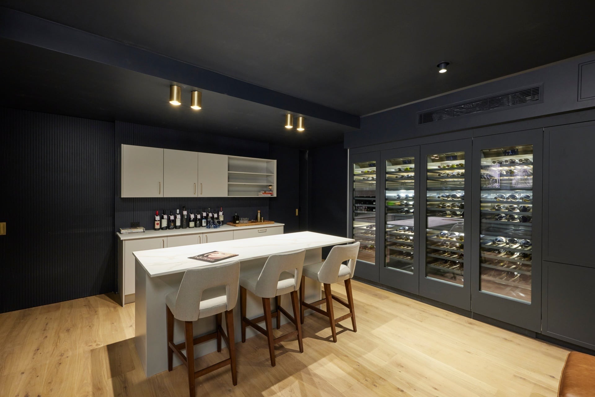 the block 2021 kirsty and jesse wine cellar black cabinets