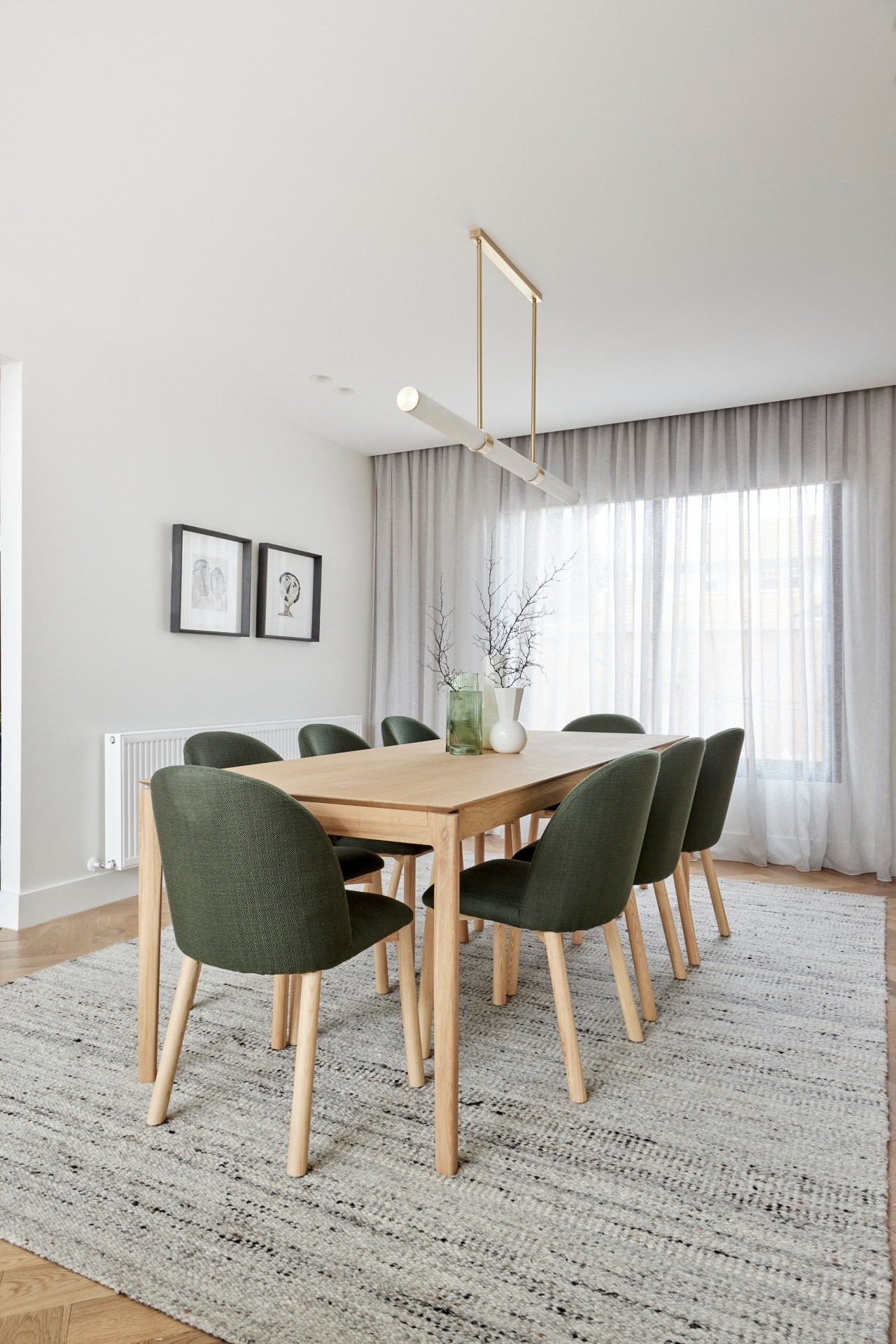 the block 2021 ronnie and georgia dining room with grey rug green velvet dining chairs
